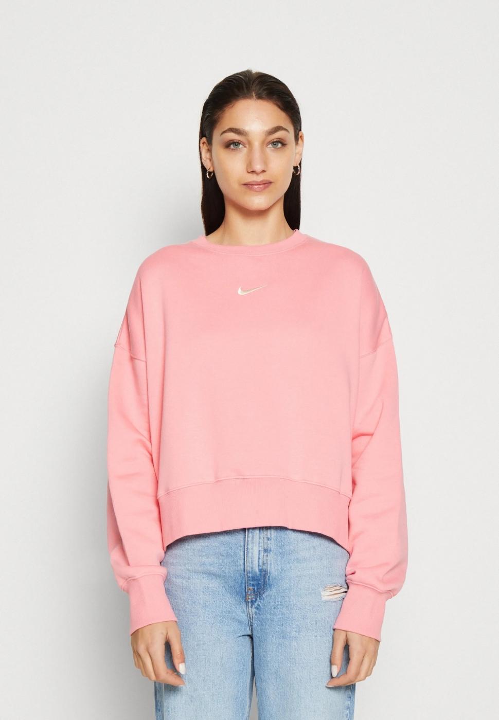 Sudaderas NIKE de la Serie Oro en color rosa para mujer.